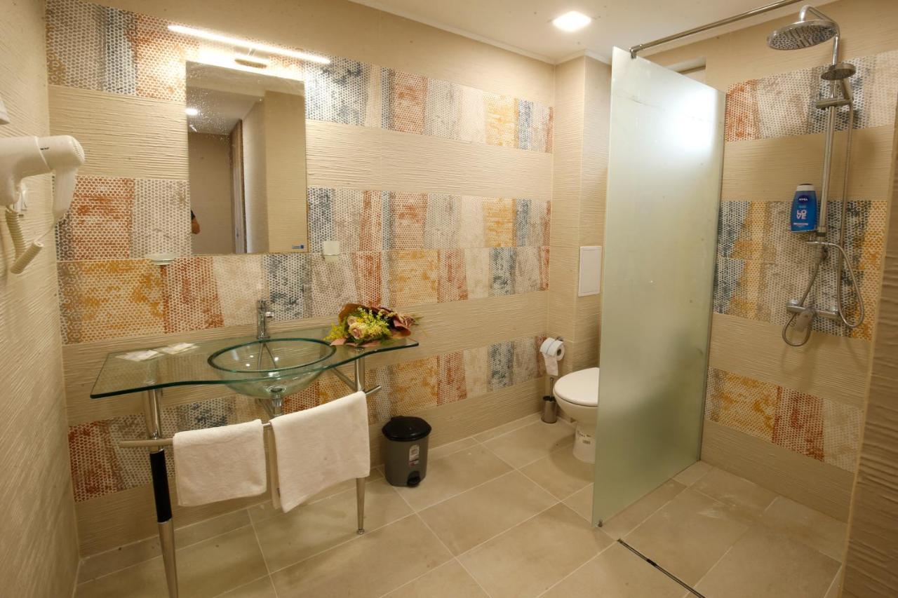 Stayinn Rainbow Houses Beachfront By Asteri Hotels ซันนีบีช ภายนอก รูปภาพ